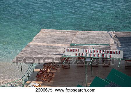 High angle view of deckchairs in restaurant, Capri, Campania, Italy View Large Photo Image Stock Photography - High angle view of deckchairs in restaurant, Capri, Campania, Italy . Fotosearch