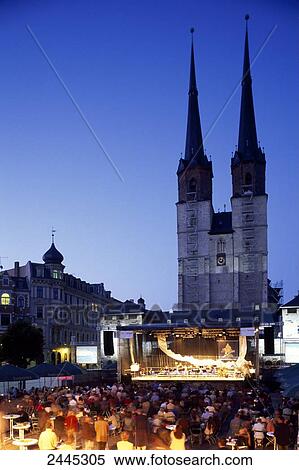 Stock Photography - High angle view of group of people at concert, Saxony-Anhalt, Germany . Fotosearch
