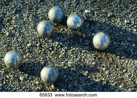 Stock Image - High angle view of metal balls . Fotosearch