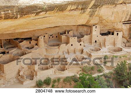 Stock Photo - High angle view of old ruins of anasazi cliff dwellings, Mesa Verde National Park, Colorado, USA . Fotosearch