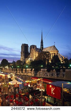 Stock Image - High angle view of people at market, Seine River, Notre-Dame, Ile De La Cite, Paris, France . Fotosearch