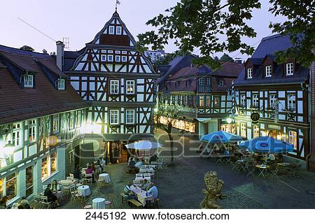 High angle view of people in coffee shop at dusk, Idstein, Darmstadt, Hesse, Germany View Large Photo Image Stock Image - High angle view of people in coffee shop at dusk, Idstein, Darmstadt, Hesse, Germany . Fotosearch