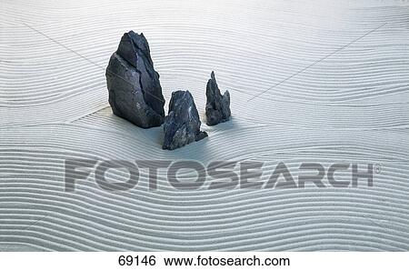 High angle view of rocks on sand View Large Photo Image Stock Photograph - High angle view of rocks on sand . Fotosearch