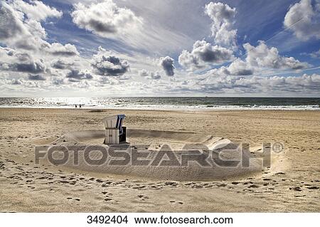 Picture - Hooded Beach Chair on the beach in Kampen, Sylt, Germany, elevated view . Fotosearch