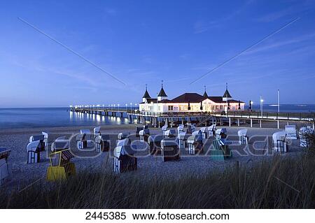 Hooded beach chairs on beach, Ahlbeck Pier, Usedom Island, Mecklenburg-West Pomerania, Germany View Large Photo Image Stock Photography - Hooded beach chairs on beach, Ahlbeck Pier, Usedom Island, Mecklenburg-West Pomerania, Germany . Fotosearch