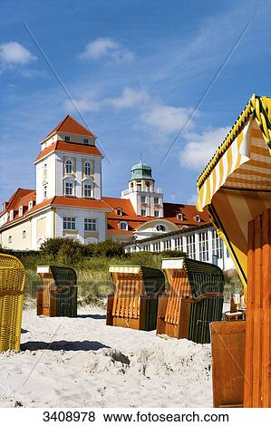 Hooded Beach Chairs on the beach of Binz, spa hotel in the background, Ruegen, Germany View Large Photo Image Stock Photo - Hooded Beach Chairs on the beach of Binz, spa hotel in the background, Ruegen, Germany . Fotosearch