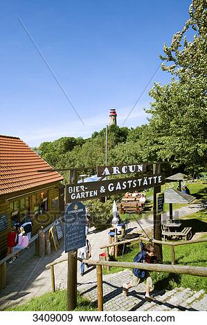 Inn and beer garden at Cape Arkona, Ruegen, Germany, elevated view View Large Photo Image Stock Photo - Inn and beer garden at Cape Arkona, Ruegen, Germany, elevated view . Fotosearch
