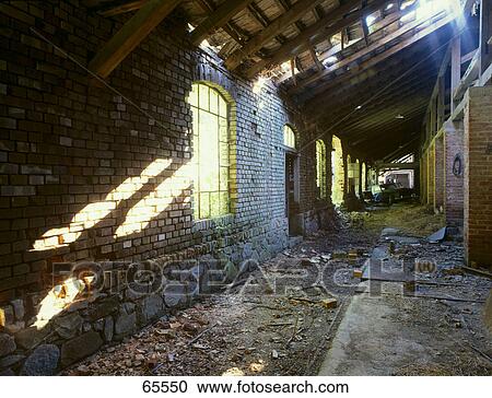 Interiors of abandoned factory storehouse View Large Photo Image Stock Image - Interiors of abandoned factory storehouse . Fotosearch