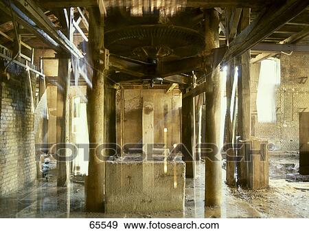 Interiors of abandoned factory storehouse View Large Photo Image Stock Photo - Interiors of abandoned factory storehouse . Fotosearch