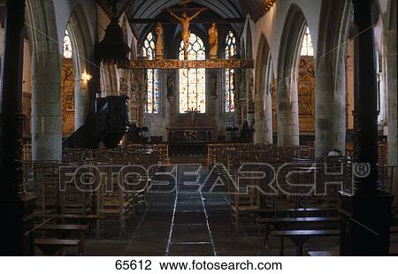 Stock Image - Interiors of church, Brittany, France . Fotosearch