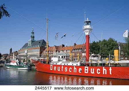 Light vessel at marina with city hall in background, Deutsche Bucht, Ratsdelft, Emden, Lower Saxony, Germany View Large Photo Image Stock Photo - Light vessel at marina with city hall in background, Deutsche Bucht, Ratsdelft, Emden, Lower Saxony, Germany . Fotosearch