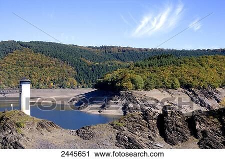 Lighthouse and lake with forest in background, Urfttalsperre, Eifel, North Rhine-Westphalia, Germany View Large Photo Image Stock Image - Lighthouse and lake with forest in background, Urfttalsperre, Eifel, North Rhine-Westphalia, Germany . Fotosearch