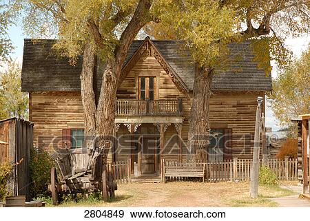 Stock Photo - Log cabin in ghost town, Nevada City, Montana, USA . Fotosearch