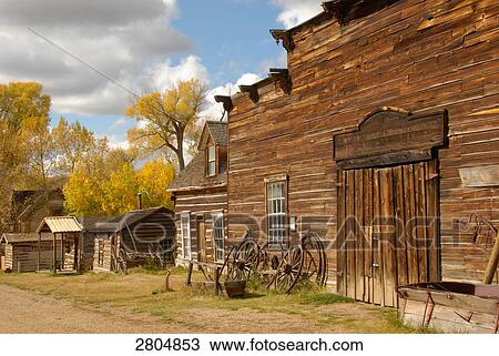 Stock Image - Log cabins in ghost town, Nevada City, Montana, USA . Fotosearch