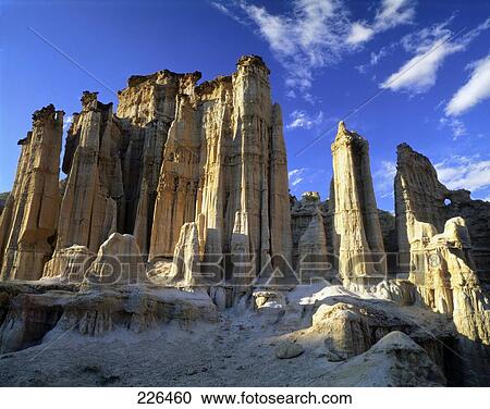 Stock Image - Low angle view of rock formations against sky, China . Fotosearch