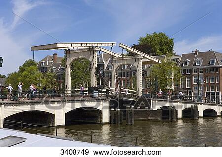 Stock Photo - Magere Brug and Amstel River, Amsterdam, Netherlands . Fotosearch