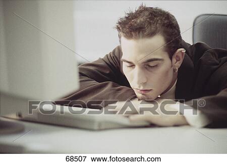 Man sleeping in office View Large Photo Image Stock Photo - Man sleeping in office . Fotosearch