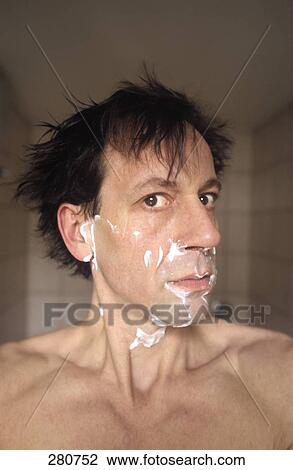 Man with shaving foam looking at camera View Large Photo Image Stock Image - Man with shaving foam looking at camera . Fotosearch