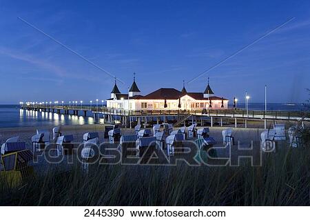 Marram grass and hooded beach chairs on beach with pier in background, Ahlbeck, Usedom, Mecklenburg-West Pomerania, Germany View Large Photo Image Stock Image - Marram grass and hooded beach chairs on beach with pier in background, Ahlbeck, Usedom, Mecklenburg-West Pomerania, Germany . Fotosearch