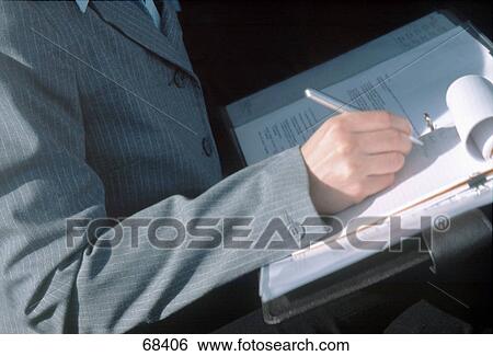 Stock Photograph - Mid section view of businesswoman signing contract . Fotosearch