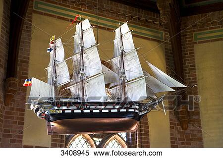 Stock Photography - Model of a ship in a church, Wustrow, Germany, low angle view . Fotosearch