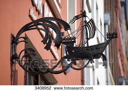 Model ship on the front of a restaurant, Rostock, Germany, low angle view View Large Photo Image Stock Image - Model ship on the front of a restaurant, Rostock, Germany, low angle view . Fotosearch