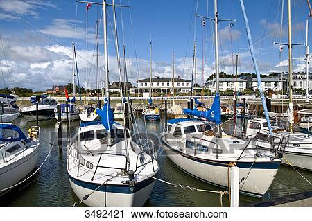 Moored yachts at the marina of Munkmarsch, Sylt, Germany View Large Photo Image Stock Image - Moored yachts at the marina of Munkmarsch, Sylt, Germany . Fotosearch