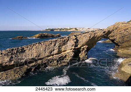 Natural arch formation in ocean, Pointe Saint-Martin, Biarritz, Pyrenees-Atlantiques, Aquitaine, France View Large Photo Image Stock Image - Natural arch formation in ocean, Pointe Saint-Martin, Biarritz, Pyrenees-Atlantiques, Aquitaine, France . Fotosearch