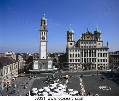 Stock Image - Outdoor cafe in front of clock tower, Perlachturm, Augsburg, Germany . Fotosearch