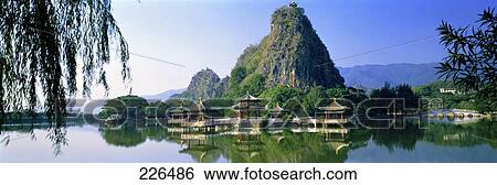 Stock Photograph - Pagodas at waterfront, China . Fotosearch