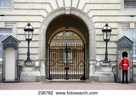 Palace guard standing at post, Buckingham Palace, London, England View Large Photo Image Stock Image - Palace guard standing at post, Buckingham Palace, London, England . Fotosearch