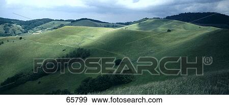 Stock Photo - Panoramic view of grassy landscape, Kaiserstuhl, Black Forest, Germany . Fotosearch