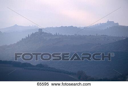 Stock Photography - Panoramic view of mountain range, Montalcino, Sienna, Tuscany, Italy . Fotosearch