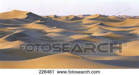 Stock Image - Panoramic view of sand dunes, China . Fotosearch