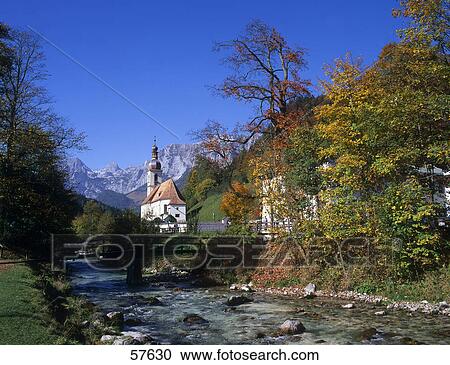 Parish church at riverside, St. Sebastian Church, Ramsau bei Berchtesgaden, Berchtesgadener Land, Bavaria, Germany View Large Photo Image Stock Image - Parish church at riverside, St. Sebastian Church, Ramsau bei Berchtesgaden, Berchtesgadener Land, Bavaria, Germany . Fotosearch