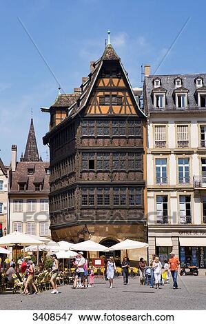 Pavement cafe and Maison Kammerzell on a square in Strasbourg, France View Large Photo Image Stock Photo - Pavement cafe and Maison Kammerzell on a square in Strasbourg, France . Fotosearch