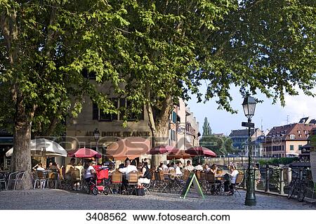 Pavement cafe in Petite France, Strasbourg, France View Large Photo Image Stock Image - Pavement cafe in Petite France, Strasbourg, France . Fotosearch