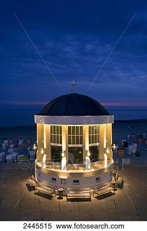 Pavilion and hooded beach chairs on beach at night, Borkum, Lower Saxony, Germany View Large Photo Image Stock Photography - Pavilion and hooded beach chairs on beach at night, Borkum, Lower Saxony, Germany . Fotosearch