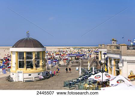 Stock Photo - Pavilion and tourists on beach, Borkum, Lower Saxony, Germany . Fotosearch