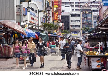 Pedestrians in a shopping street, Chinatown, Kuala Lumpur, Malaysia View Large Photo Image Stock Image - Pedestrians in a shopping street, Chinatown, Kuala Lumpur, Malaysia . Fotosearch