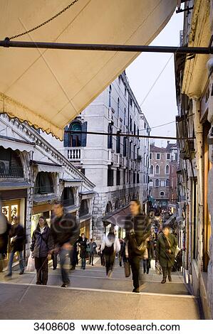 Pedestrians in an alley, Venice, Italy, elevated view View Large Photo Image Stock Photo - Pedestrians in an alley, Venice, Italy, elevated view . Fotosearch