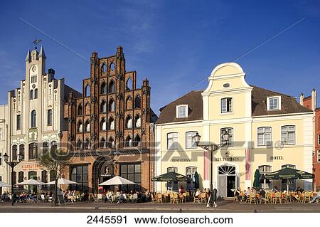 People at outdoor cafe, Wismar, Mecklenburg-Western Pomerania, Germany View Large Photo Image Stock Image - People at outdoor cafe, Wismar, Mecklenburg-Western Pomerania, Germany . Fotosearch