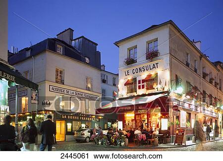 Stock Image - People at sidewalk cafe, Paris, France . Fotosearch