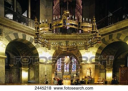 Stock Photo - People in church, Aachen, Rhineland, North Rhine-Westphalia, Germany . Fotosearch