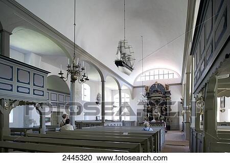 Stock Image - People in church, Mecklenburg-Western Pomerania, Germany . Fotosearch