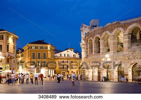 People on a square (Piazza Bra) at the amphitheatre, Verona, Italy View Large Photo Image Stock Photo - People on a square (Piazza Bra) at the amphitheatre, Verona, Italy . Fotosearch