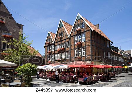 People sitting at outdoor cafe, Muenster, North Rhine-Westphalia, Germany View Large Photo Image Stock Photo - People sitting at outdoor cafe, Muenster, North Rhine-Westphalia, Germany . Fotosearch