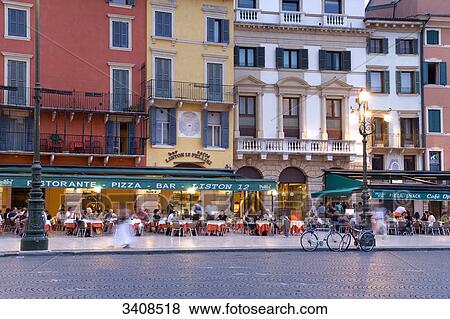 People sitting in outdoor restaurant, Piazza Bra, Verona, Italy View Large Photo Image Stock Photo - People sitting in outdoor restaurant, Piazza Bra, Verona, Italy . Fotosearch