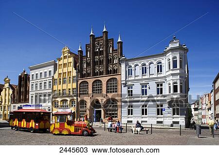 People sitting on benches at square, Stralsund, Mecklenburg-Western Pomerania, Germany View Large Photo Image Stock Image - People sitting on benches at square, Stralsund, Mecklenburg-Western Pomerania, Germany . Fotosearch