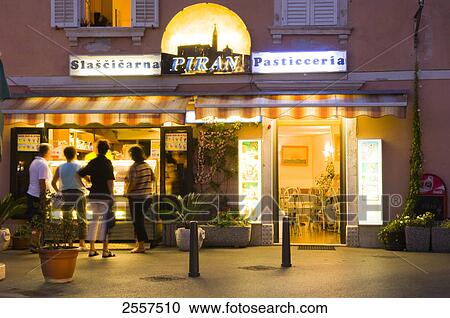 Stock Image - People standing in front of store . Fotosearch